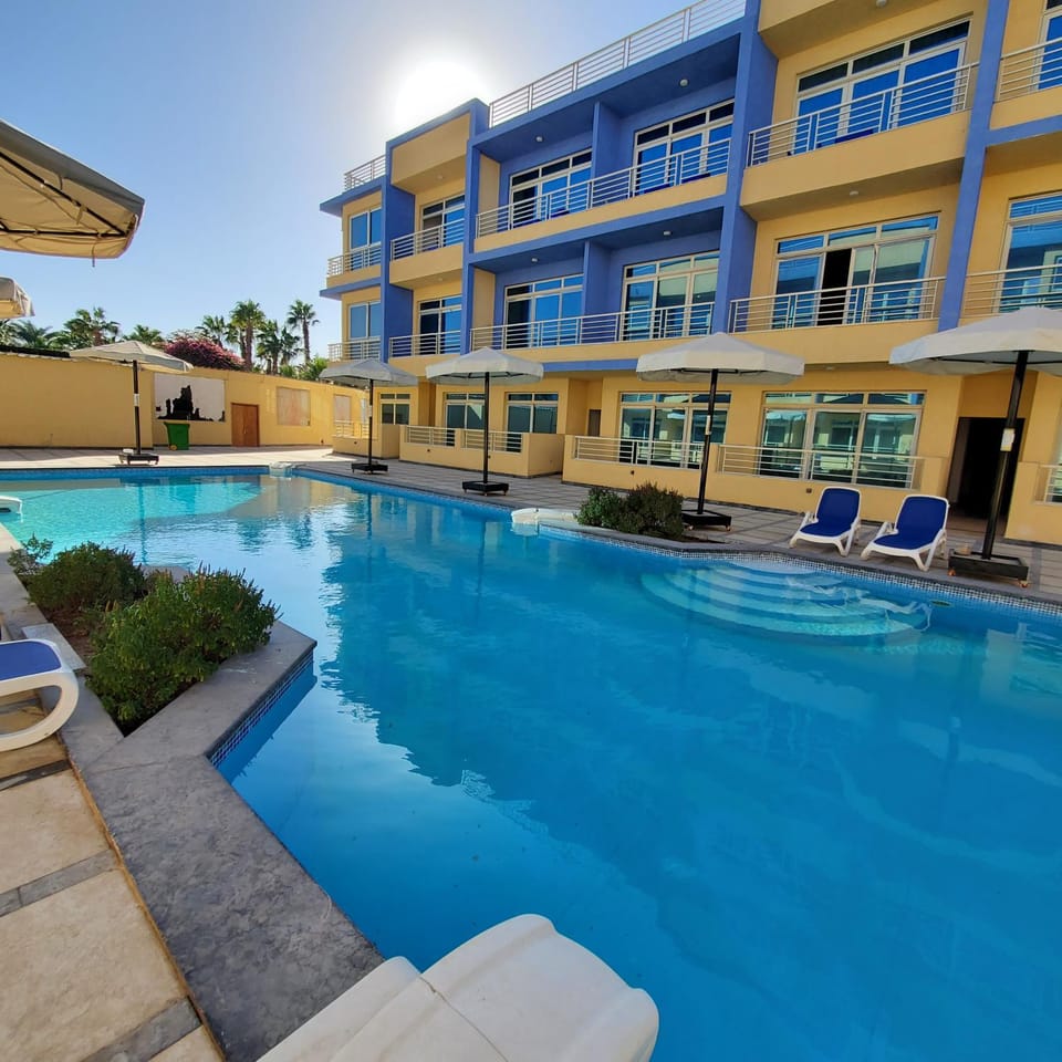 Property building, Pool view, Swimming pool, Swimming pool
