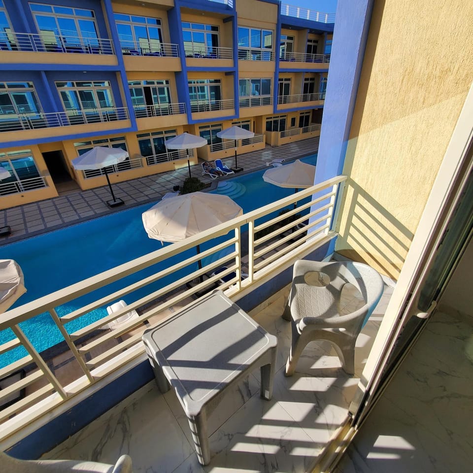 View (from property/room), Balcony/Terrace, Pool view, Swimming pool