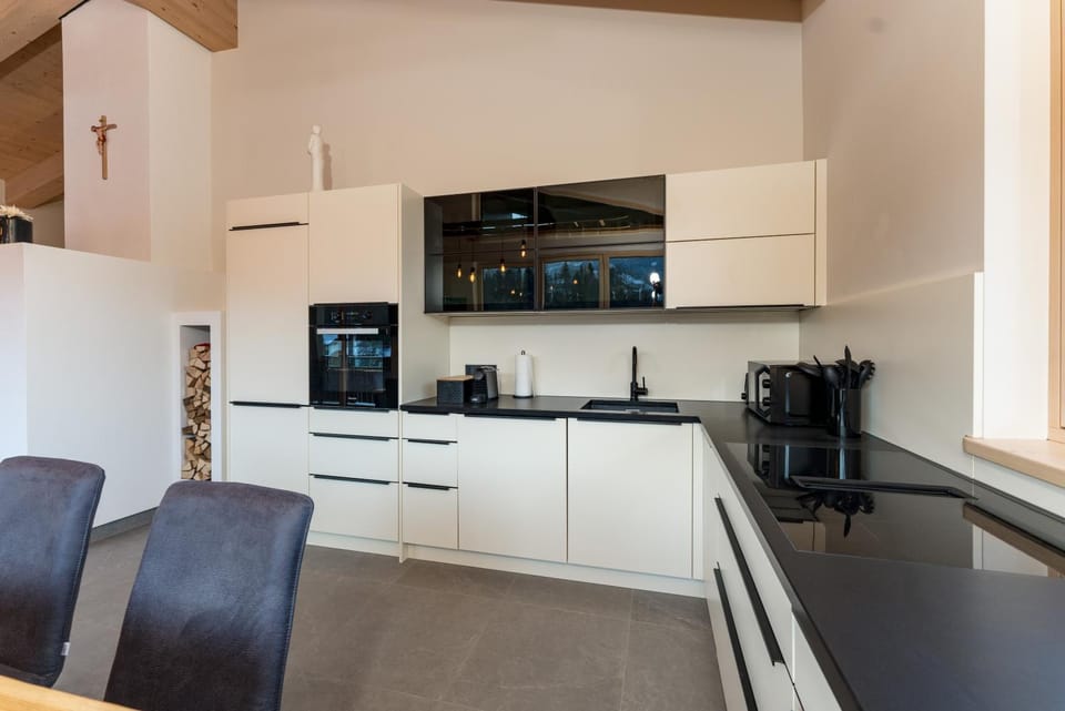 Kitchen or kitchenette, dishwasher, stove, toaster