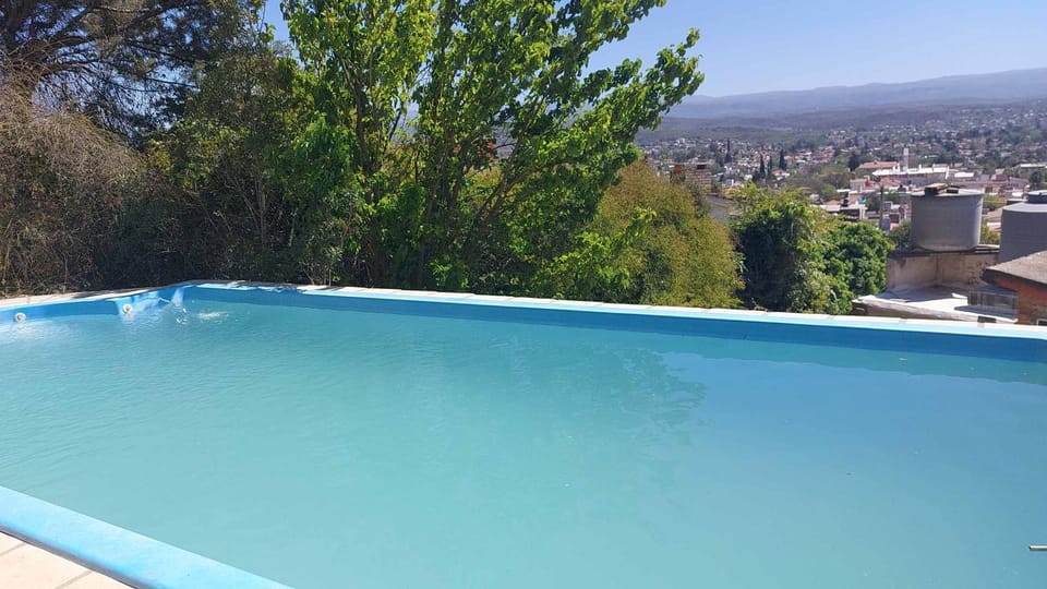 Chalet de Montaña a 8 cuadras del centro de Carlos Paz con pileta de 9 x 4 Chalet in Villa Carlos Paz