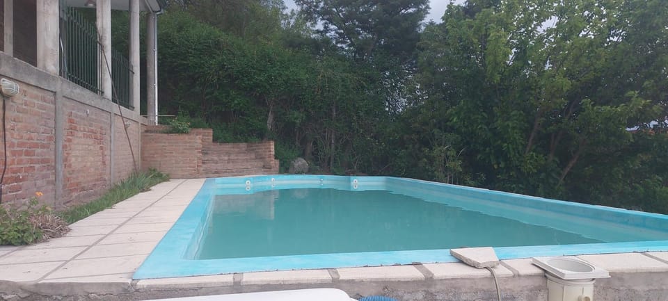 Chalet de Montaña a 8 cuadras del centro de Carlos Paz con pileta de 9 x 4 Chalet in Villa Carlos Paz