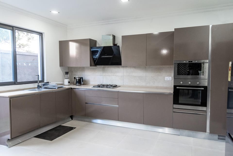 Kitchen or kitchenette, oven, stove