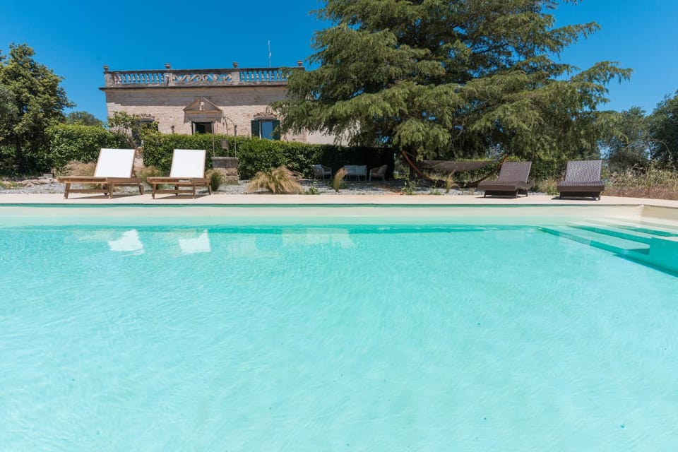 Property building, Living room, Swimming pool