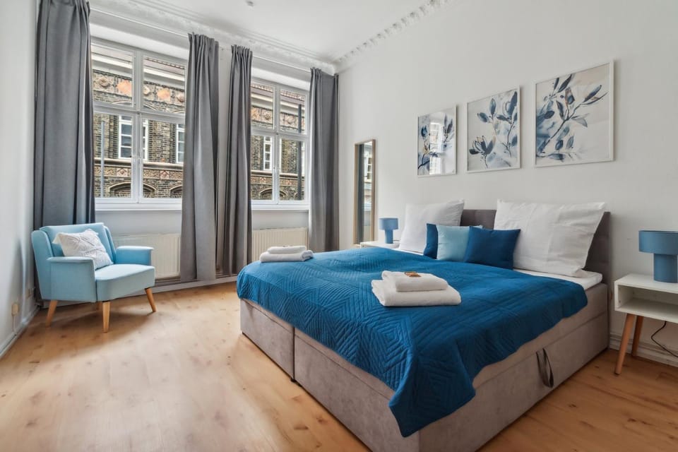 Bed, Photo of the whole room, Seating area, Bedroom, cot, flat iron, towels, wardrobe