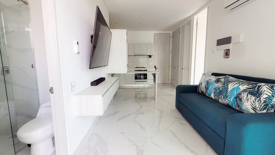 Bed, TV and multimedia, Living room, Seating area