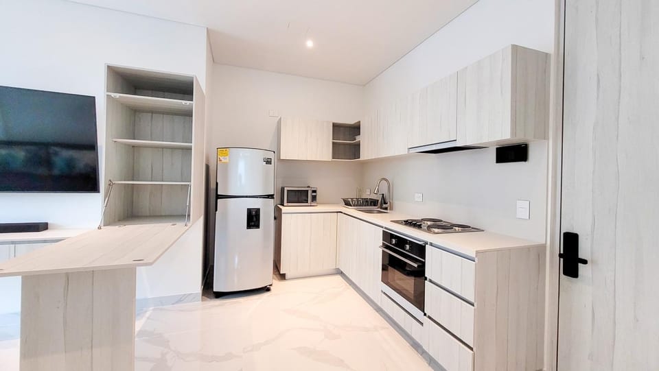 Kitchen or kitchenette, oven