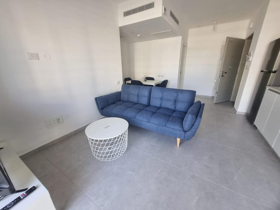 Kitchen or kitchenette, Living room, Seating area, air conditioner