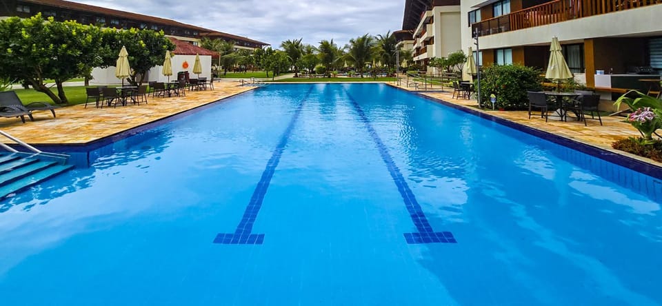 Property building, Day, Pool view, Swimming pool, sunbed