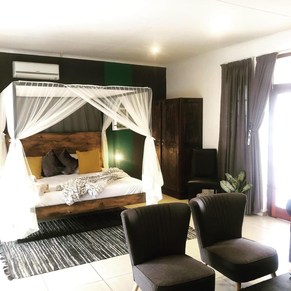 Bed, Living room, Seating area, Bedroom