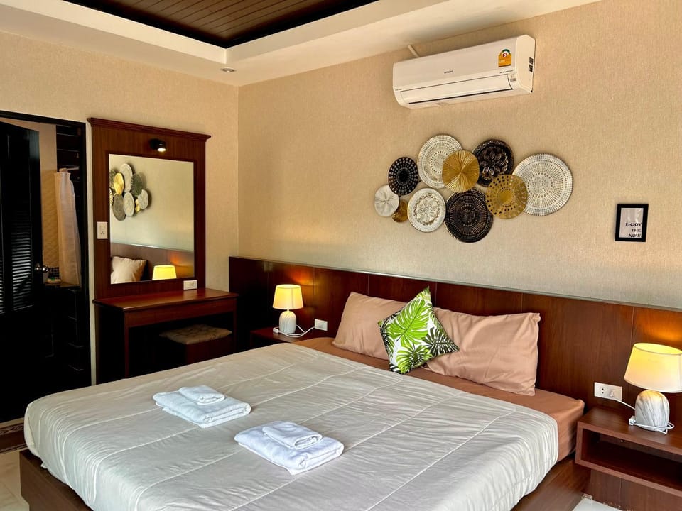 Photo of the whole room, Bedroom, towels, air conditioner