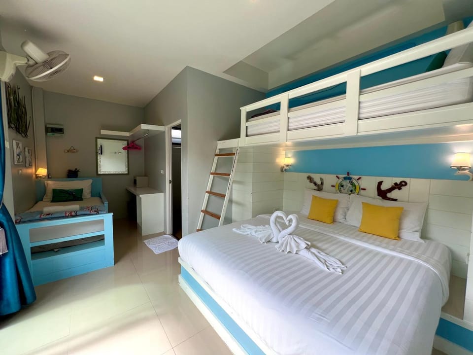 Bed, Photo of the whole room, Bedroom, bunk bed, towels, air conditioner