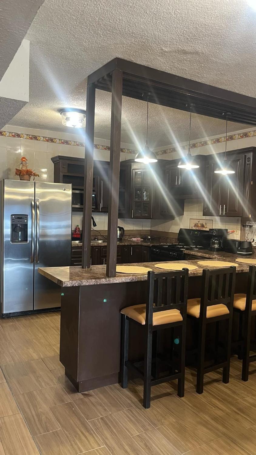 Kitchen or kitchenette, stove, kitchen