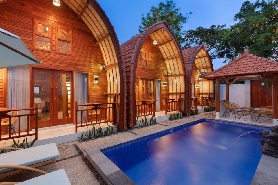 Property building, Patio, Night, Pool view, Swimming pool, sunbed