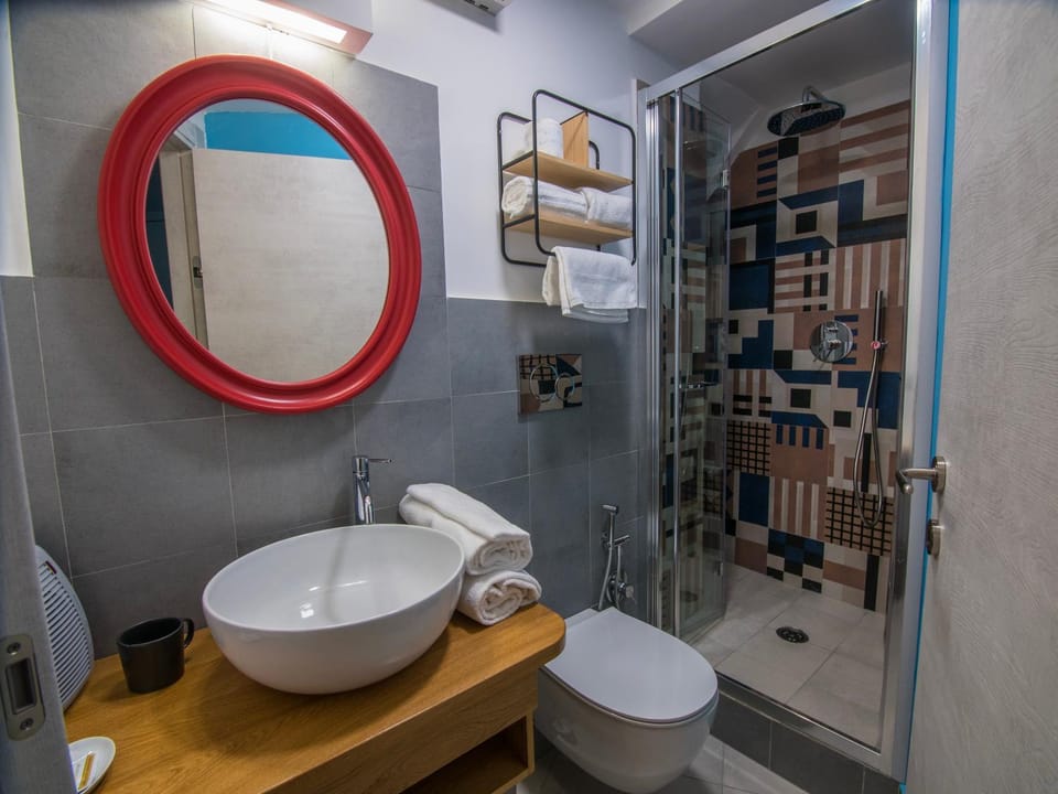 Shower, Toilet, Bathroom, bidet, hair dryier, towels, towels