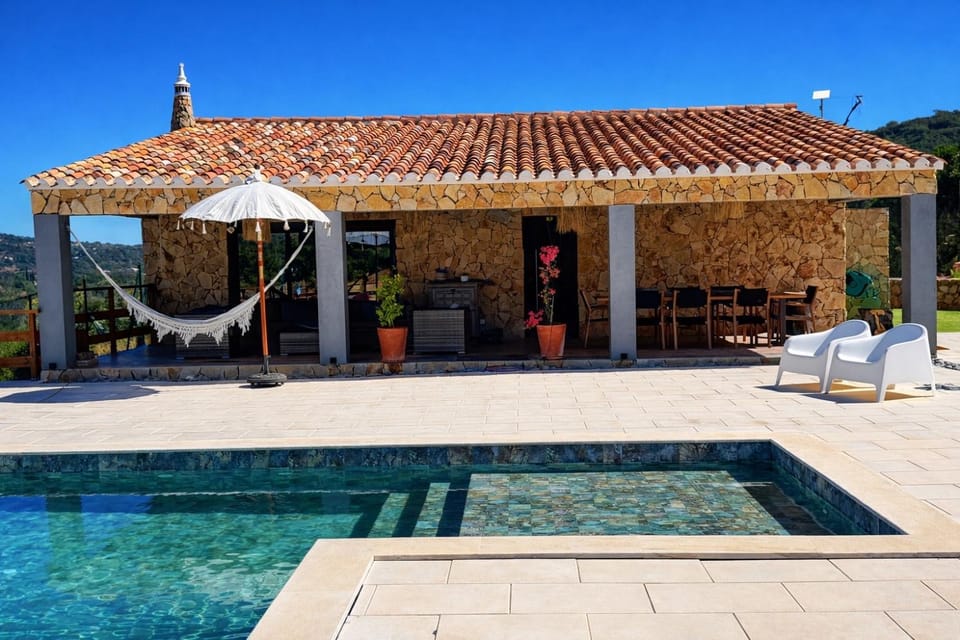 Property building, Patio, Day, Natural landscape, Pool view, Swimming pool