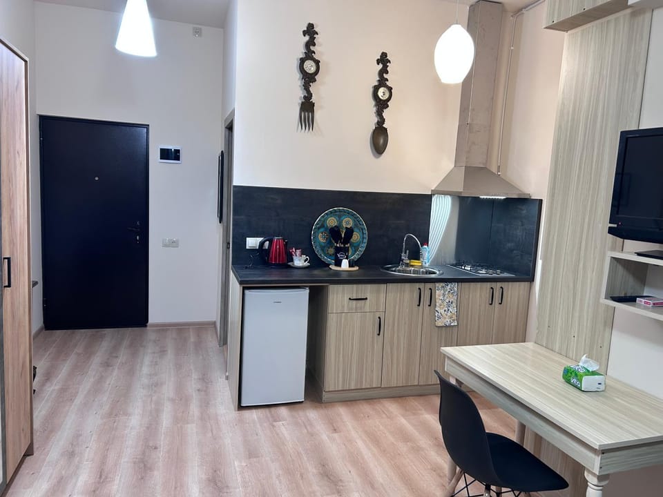 Kitchen or kitchenette, stove