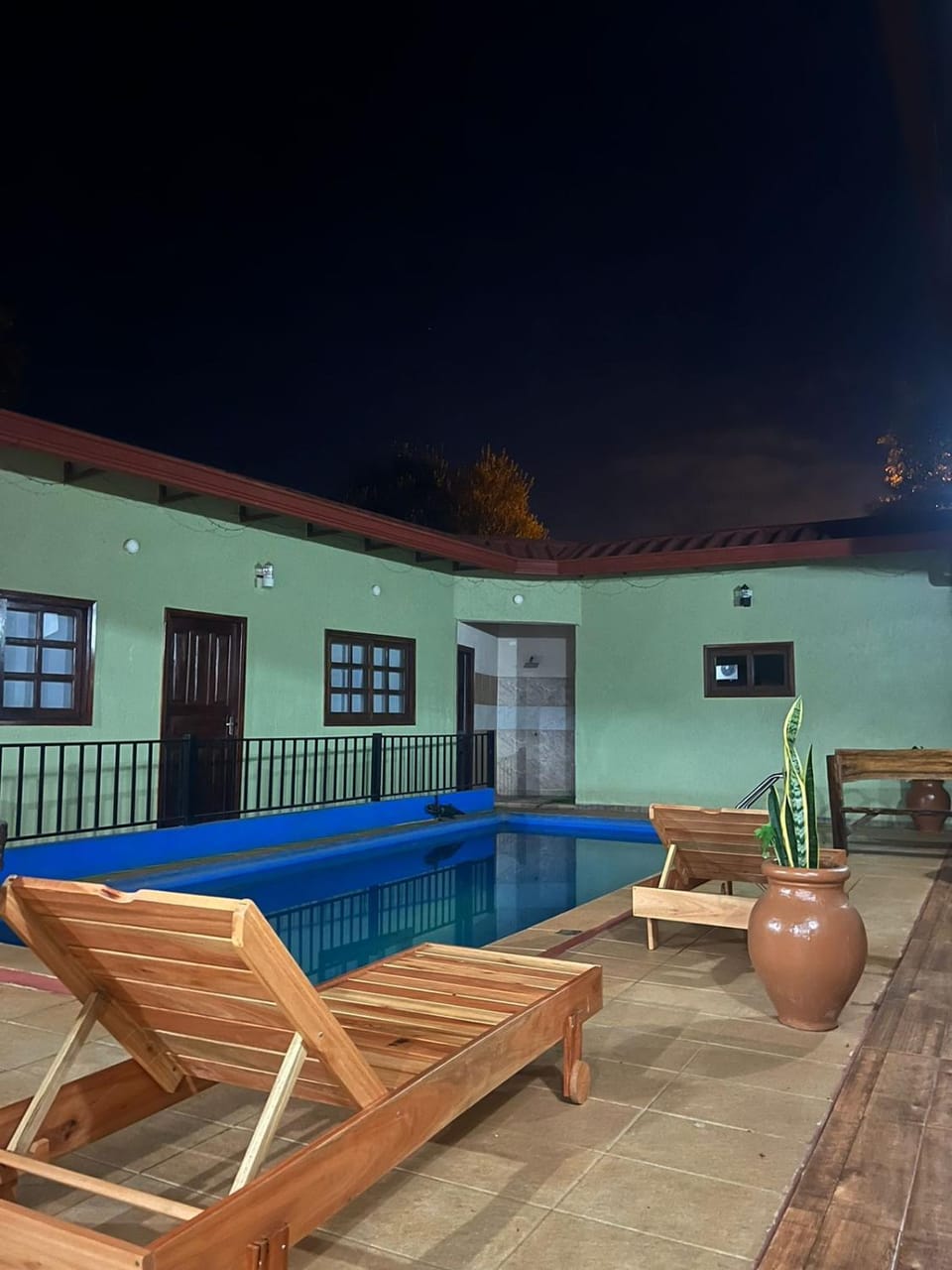 Patio, Night, Pool view, Swimming pool, sunbed