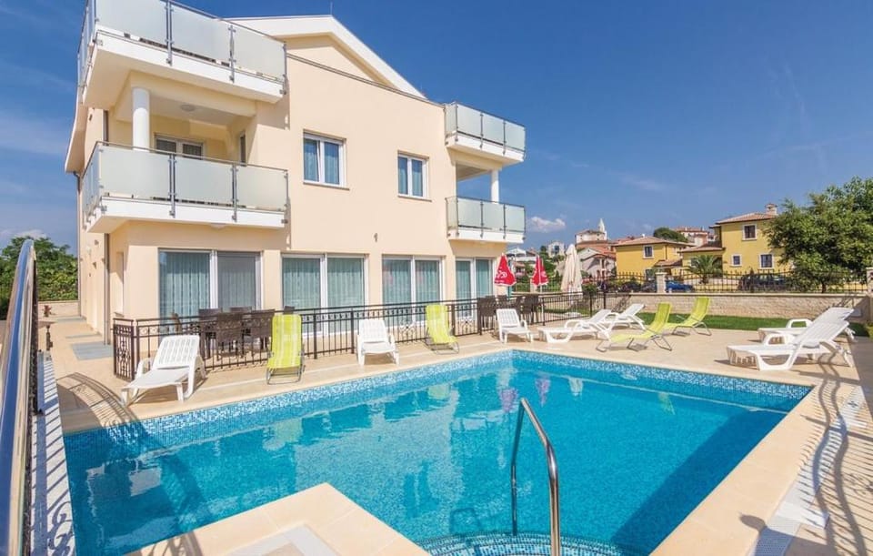 Property building, Pool view, Swimming pool, sunbed