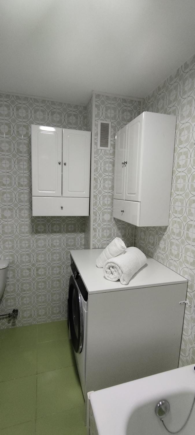 Bathroom, towels, washing machine