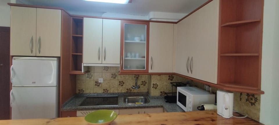 Kitchen or kitchenette, oven, stove