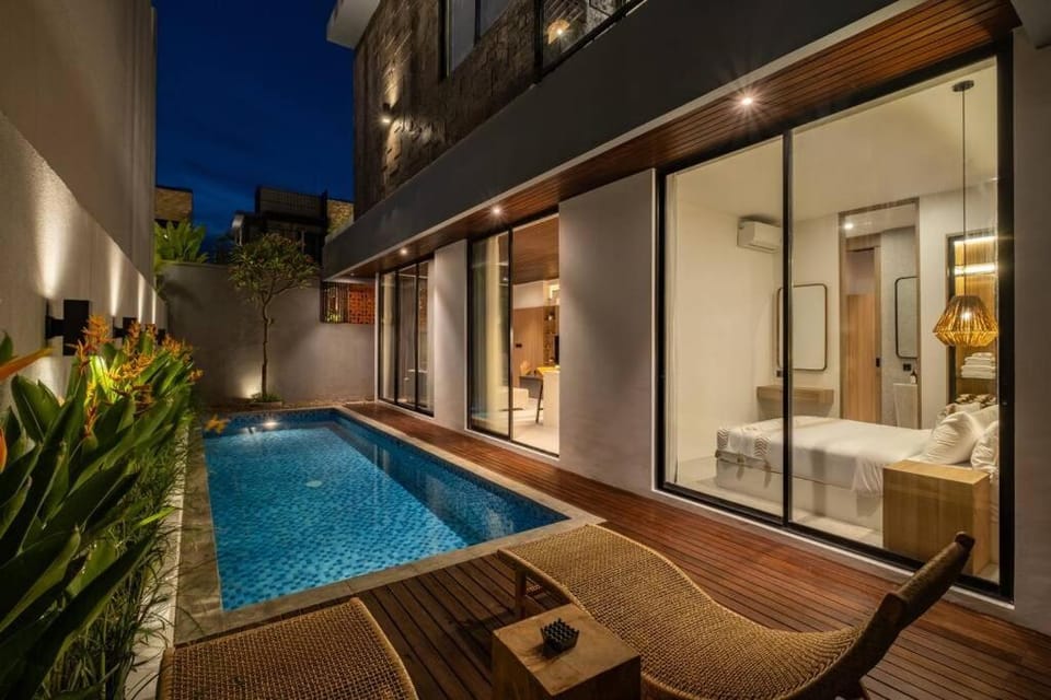 Property building, Night, Pool view, Swimming pool, sunbed