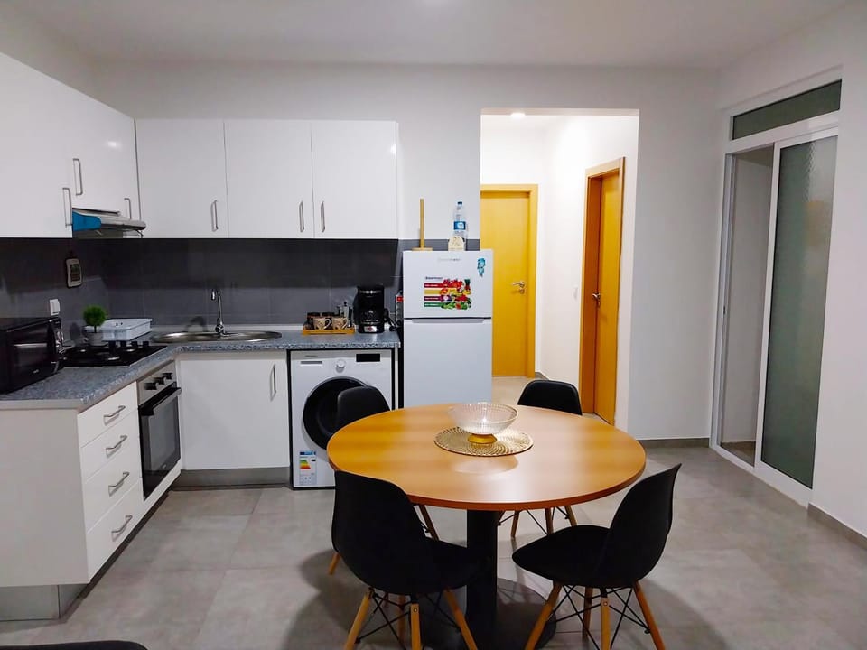 Kitchen or kitchenette, Dining area, oven, stove, washing machine