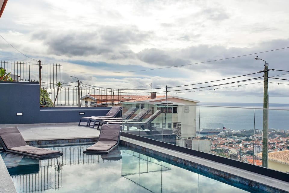 Property building, Living room, Swimming pool
