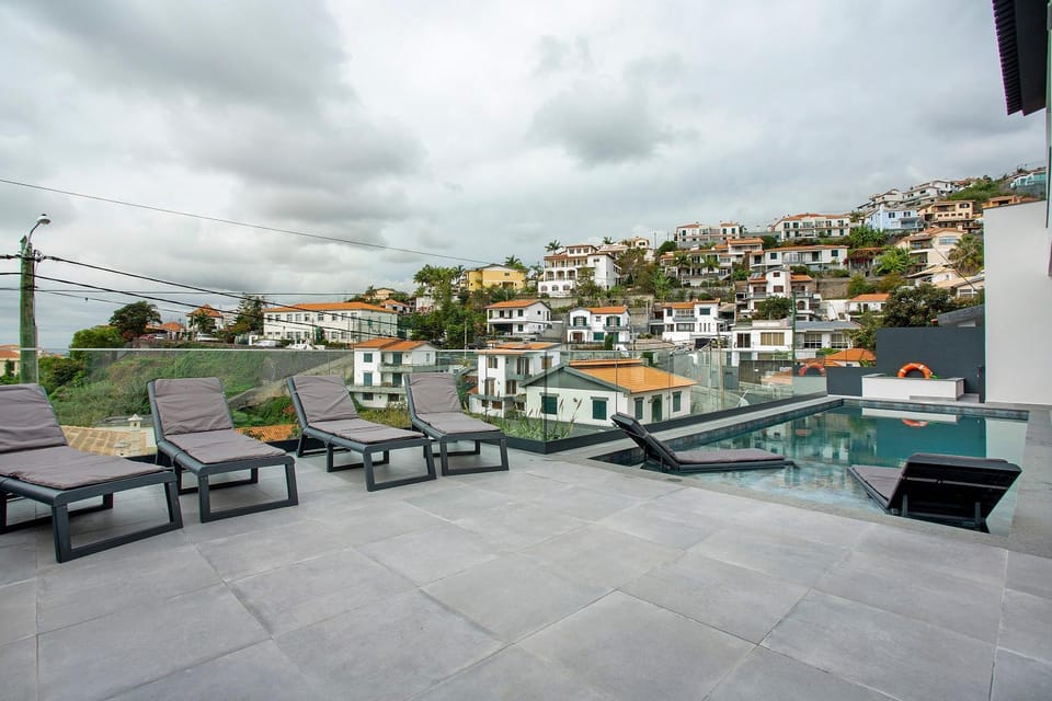 Property building, Living room, Swimming pool