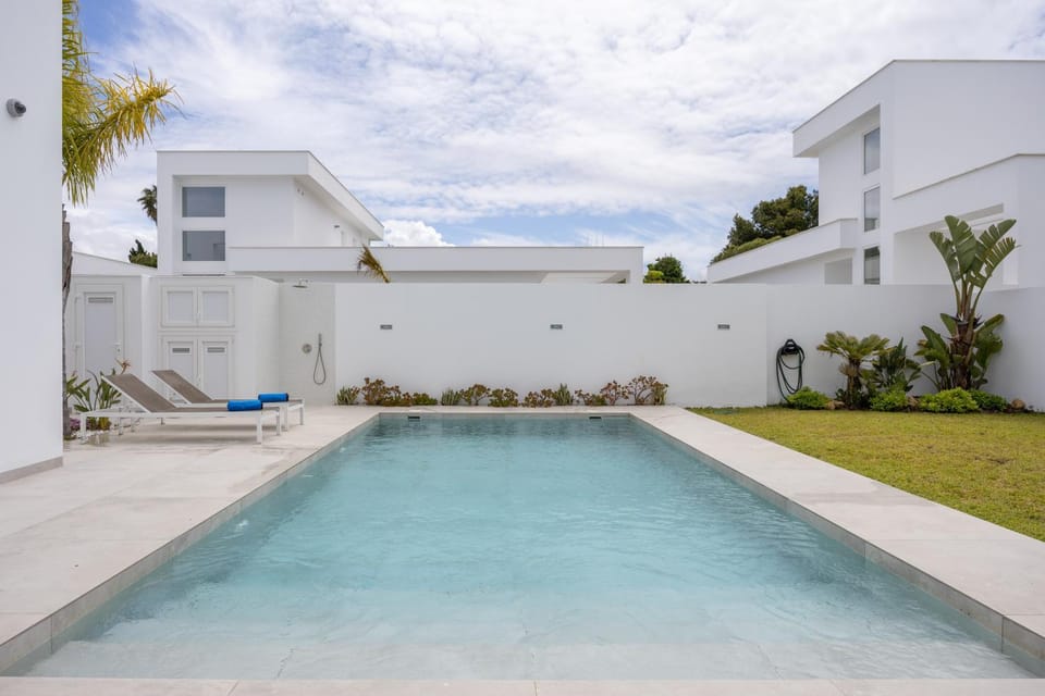 Property building, Living room, Swimming pool
