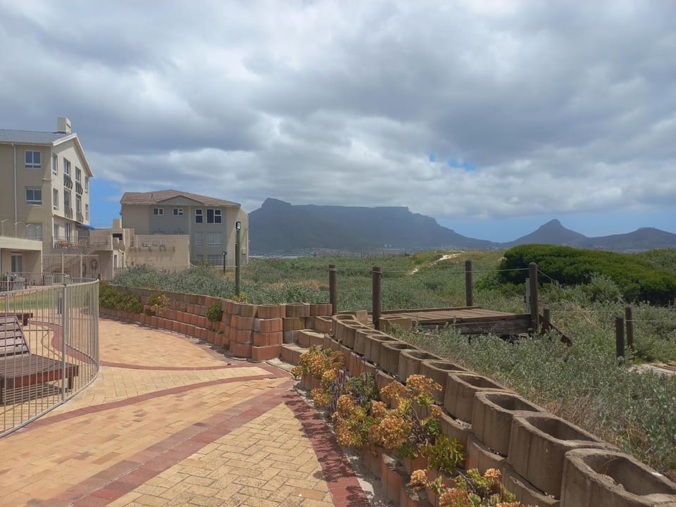 Property building, Nearby landmark, Natural landscape, Mountain view