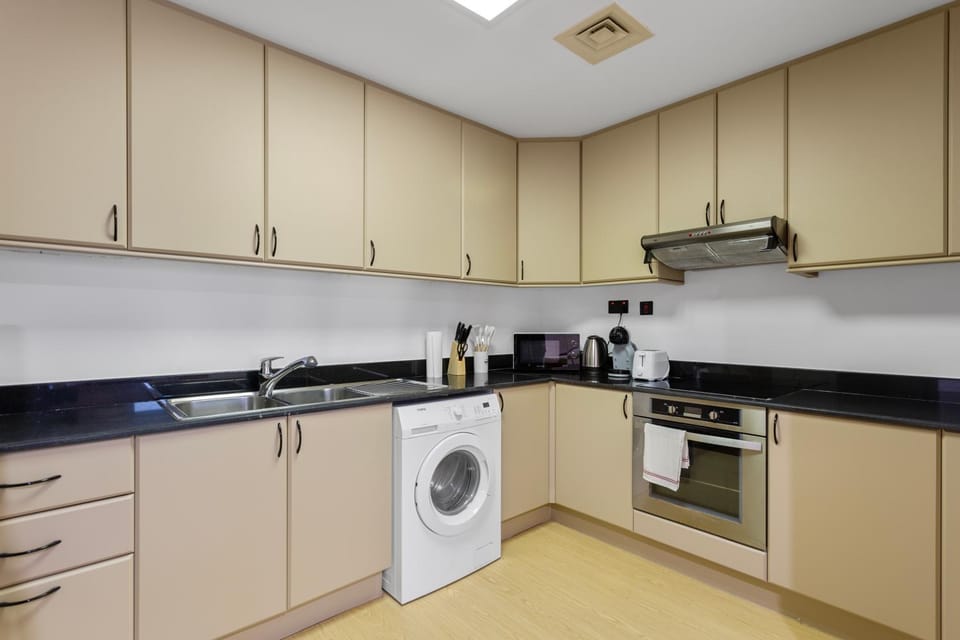 Kitchen or kitchenette, oven, stove, toaster