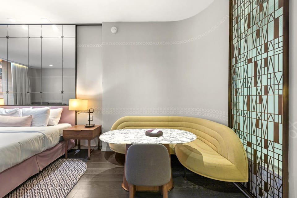 Bed, Living room, Seating area, Bedroom, air conditioner