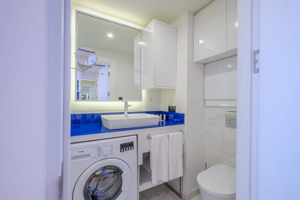 Shower, Toilet, Bathroom, Bath, towels, washing machine, dryer