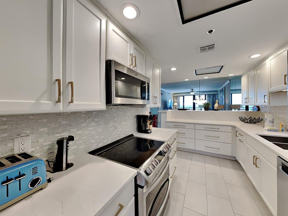 Kitchen or kitchenette, microwave, oven, stove, toaster, kitchen