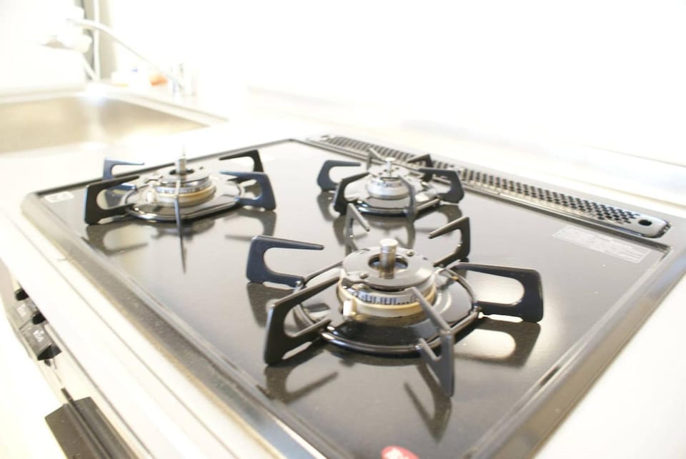 Kitchen or kitchenette, stove