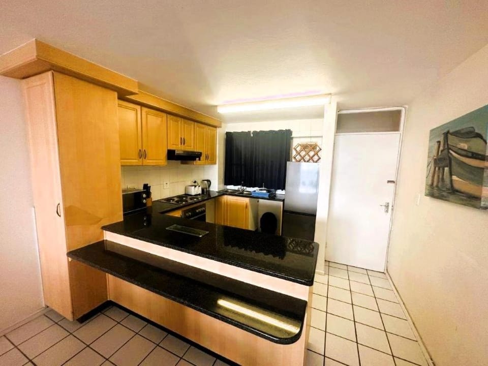Kitchen or kitchenette, oven, stove