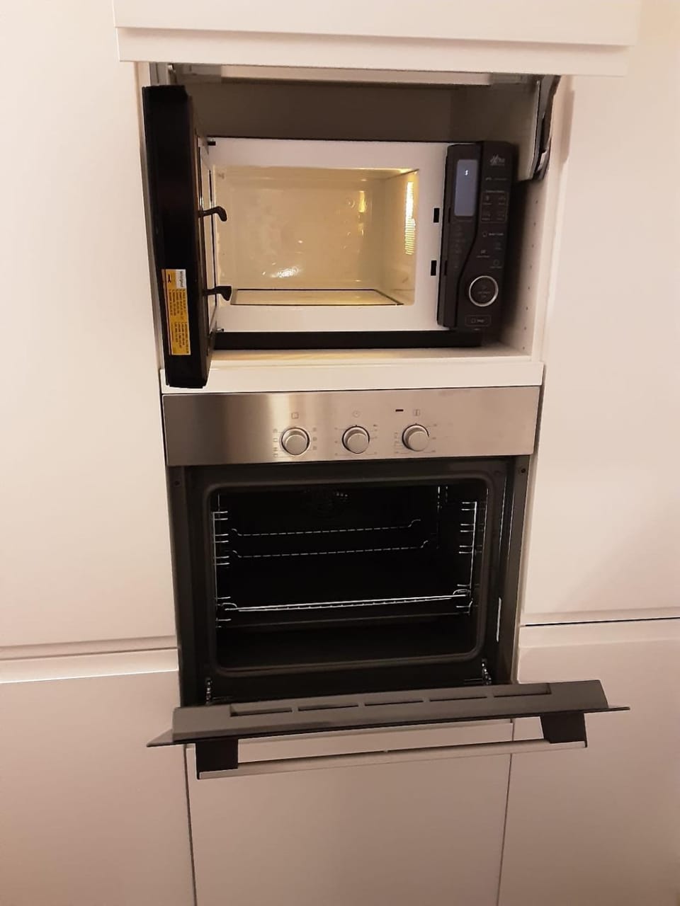 Kitchen or kitchenette, microwave, oven