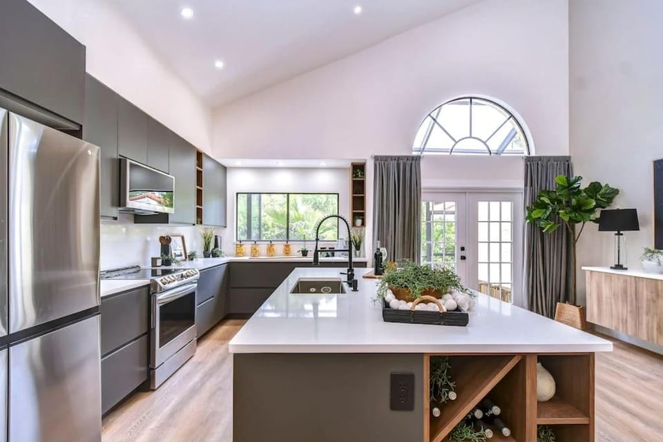 Kitchen or kitchenette, dishwasher, oven, stove