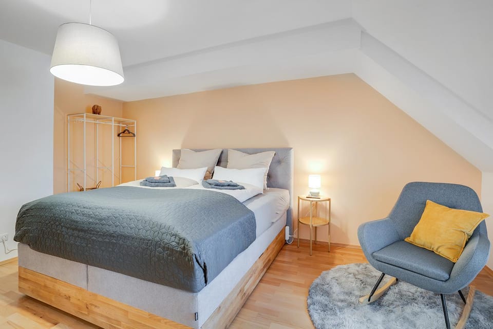 Bed, Photo of the whole room, Seating area, Bedroom, towels, wardrobe