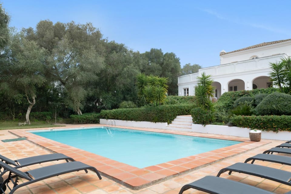 Property building, Living room, Swimming pool