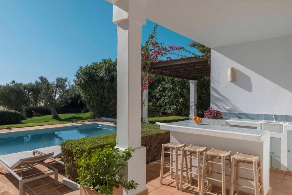 Property building, Kitchen or kitchenette, Living room, Swimming pool