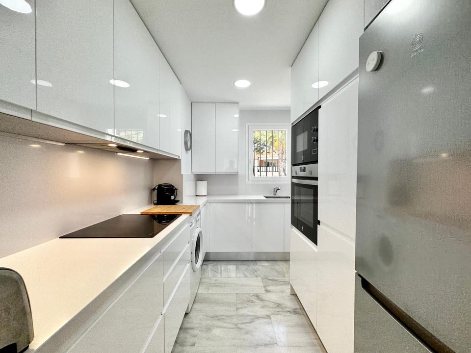 Kitchen or kitchenette, oven, stove
