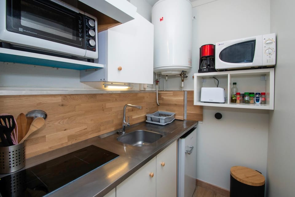 Kitchen or kitchenette, stove