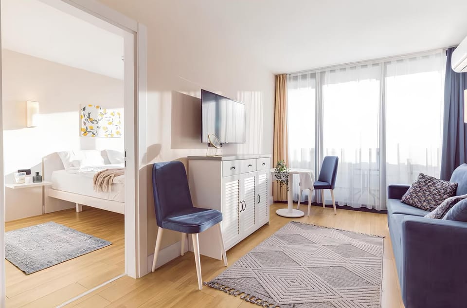 Communal lounge/ TV room, Bed, TV and multimedia, Living room, Photo of the whole room, Seating area, Evening entertainment, Bedroom, hair dresser, wardrobe