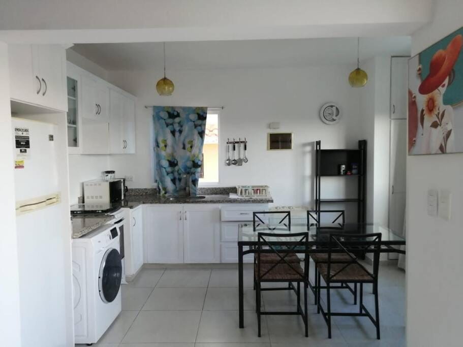 Kitchen or kitchenette, Dining area, washing machine, dryer