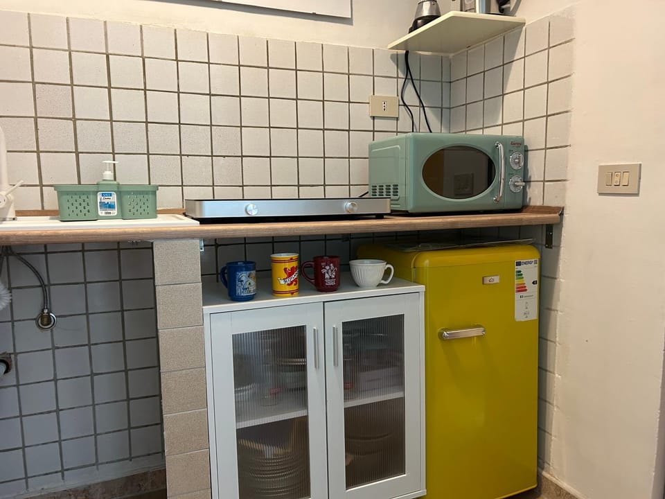 Kitchen or kitchenette, stove