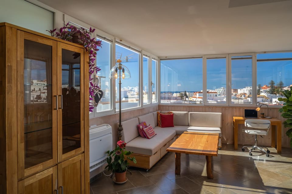 View (from property/room), Living room, Seating area, Sea view