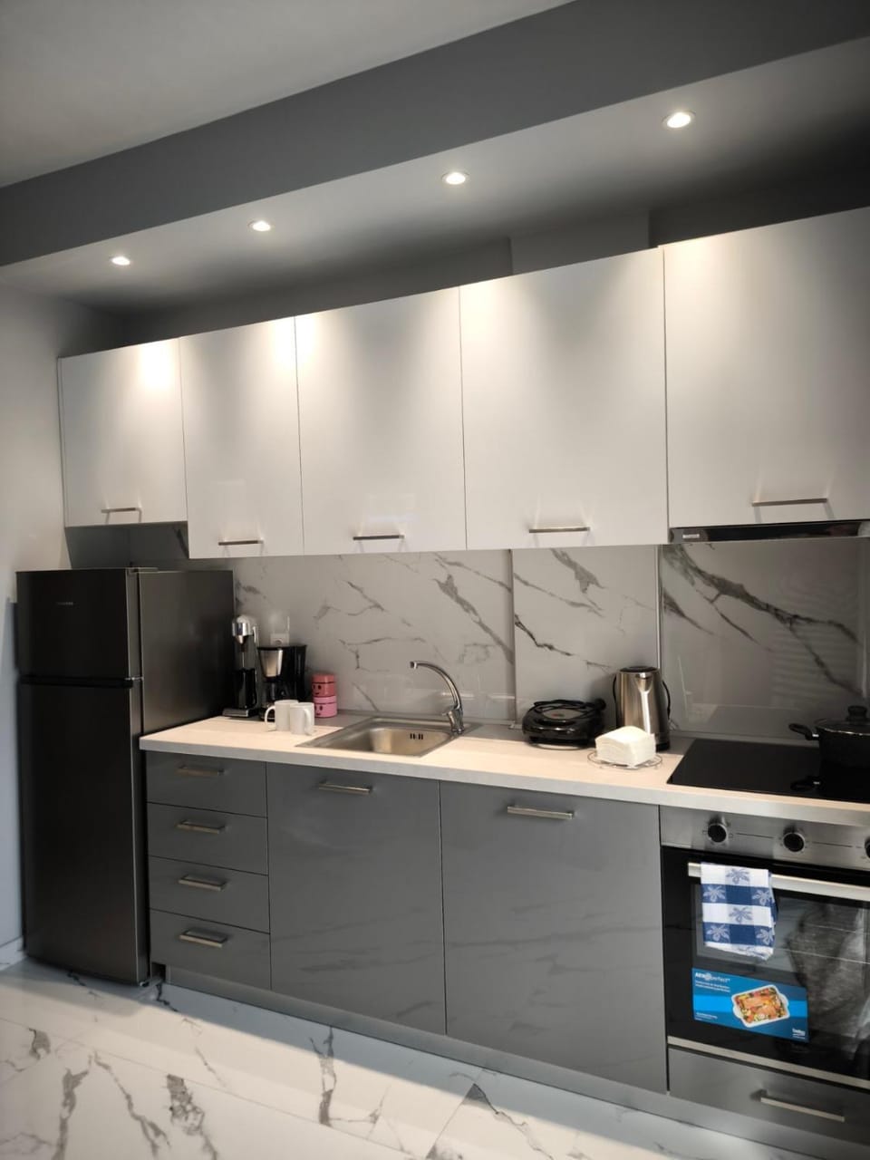 Kitchen or kitchenette, oven, stove