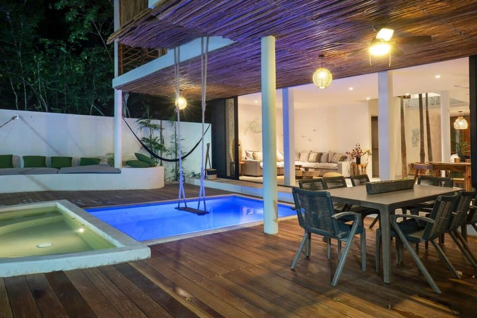 Patio, Night, Dining area, Pool view, Swimming pool, sunbed