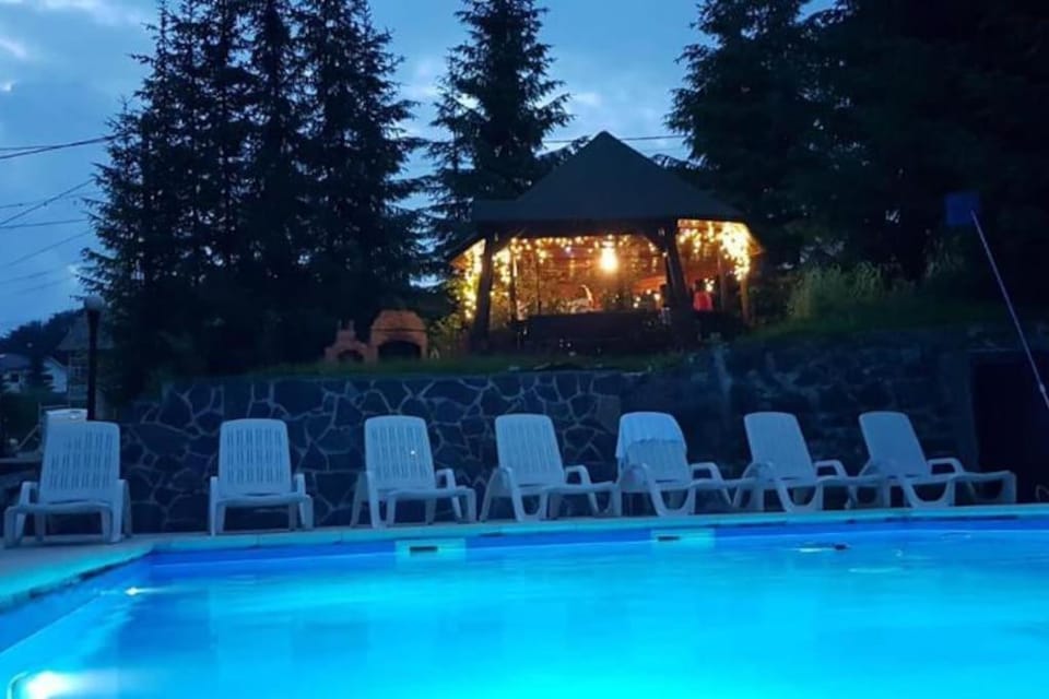 Property building, Night, Natural landscape, Garden, Garden view, Pool view, Swimming pool, Swimming pool, sunbed